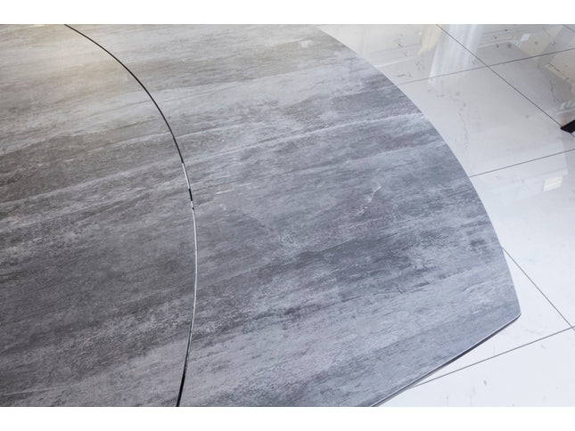 Extendable dining table with chairs