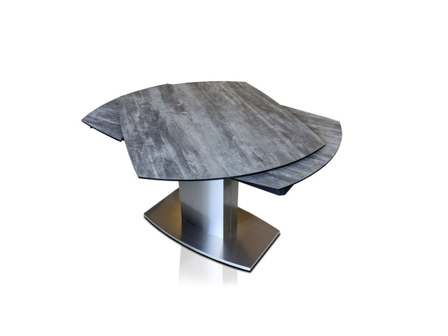 Extendable dining table with chairs